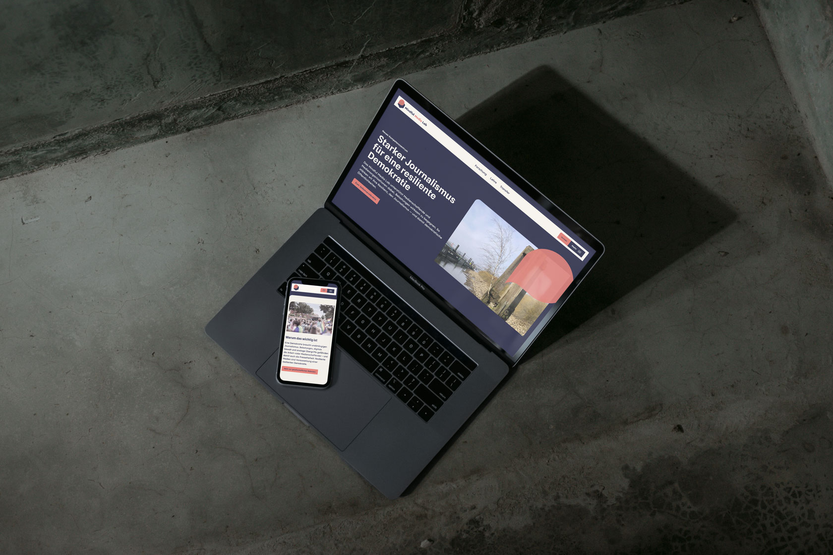 Laptop and Phone showing the website of Mindful Media Lab